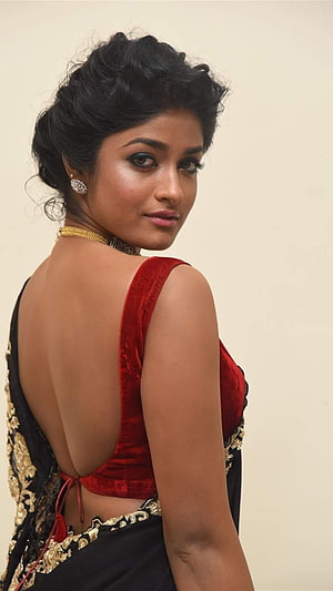 Dimple Hayathi in a red velvet blouse and black gold embroidered saree HD phone wallpaper