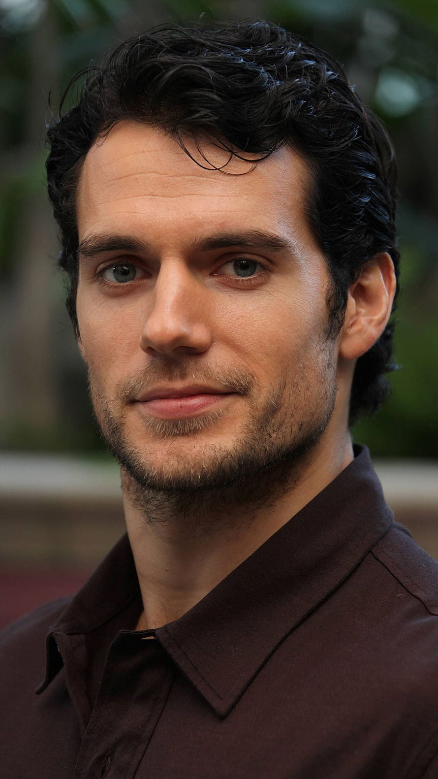 Henry Cavill Close-Up Portrait with Dark Hair and Brown Shirt HD phone wallpaper