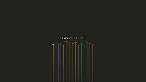Stay Positive Motivational Quote With Colorful Upward Arrows On Dark Background HD wallpaper
