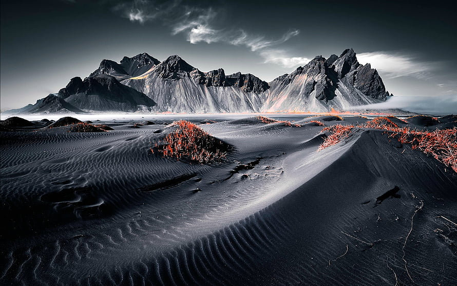 Vestrahorn Mountain and Black Sand Dunes in Iceland Under Dramatic Skies HD wallpaper