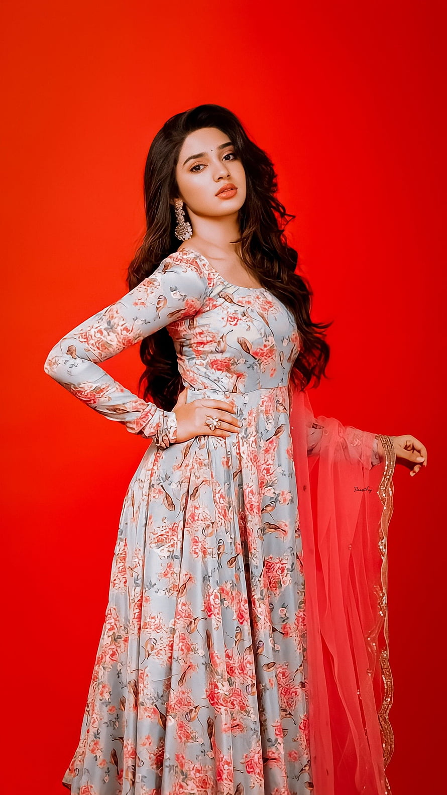 Keerthy Suresh in a Floral Anarkali Suit with Red Background HD phone wallpaper