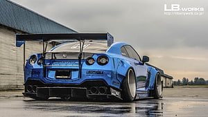 Blue Nissan GT-R R35 with Liberty Walk Widebody Kit and Large Rear Wing HD wallpaper