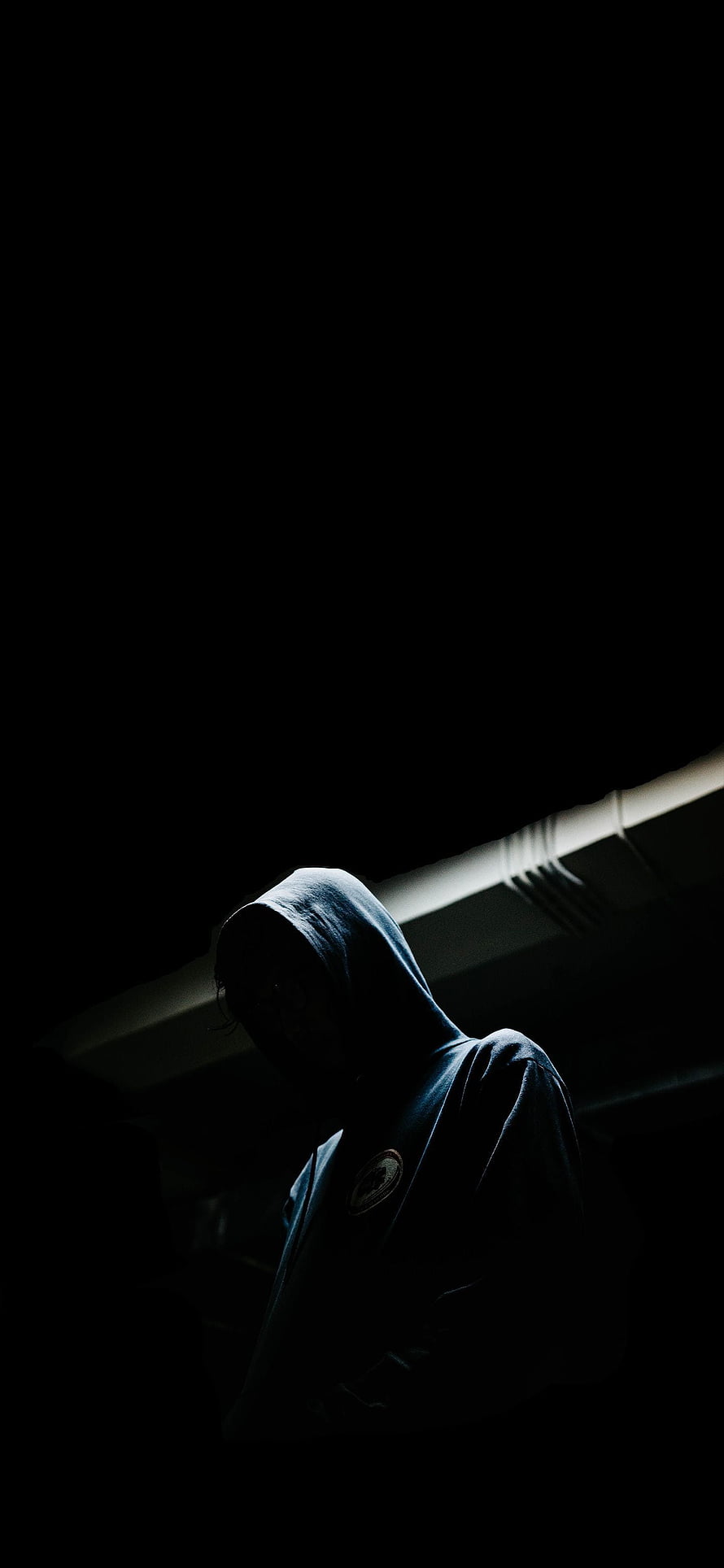 Mysterious Hooded Figure in Dramatic Low-Key Lighting HD phone wallpaper