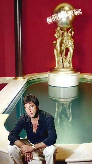 Al Pacino in Scarface Sitting by the Pool with the World is Yours Statue HD phone wallpaper