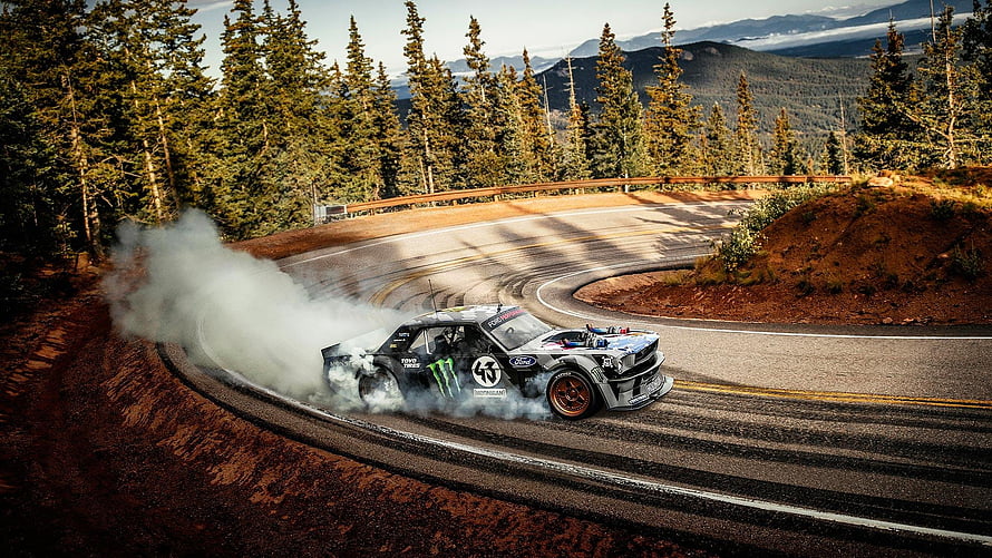 Ken Block Hoonicorn Ford Mustang Drifting Through Mountain Forest Curve HD wallpaper