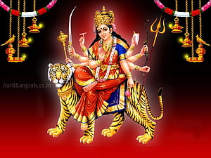 Goddess Durga Riding Tiger With Trishul And Sword On Red Background HD wallpaper