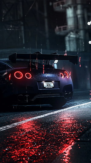 Nissan GT-R Rear View on Wet Night Street with Red Taillight Reflections HD phone wallpaper
