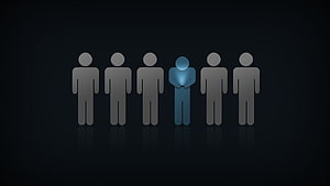 Minimalist team concept with one highlighted individual standing out from a group of silhouettes HD wallpaper