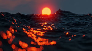 Dramatic Sunset Over Dark Ocean Waves With Golden Sunlight Reflections HD wallpaper