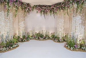 Elegant Floral Wedding Ceremony Backdrop with Hanging Blooms and Garden Arrangements HD wallpaper