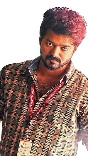 Vijay in a plaid shirt with a college lanyard and intense expression HD phone wallpaper