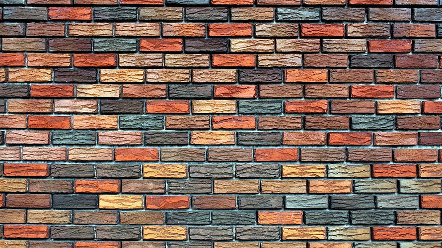 Multicolored Brick Wall Texture with Rustic Red and Brown Tones HD wallpaper