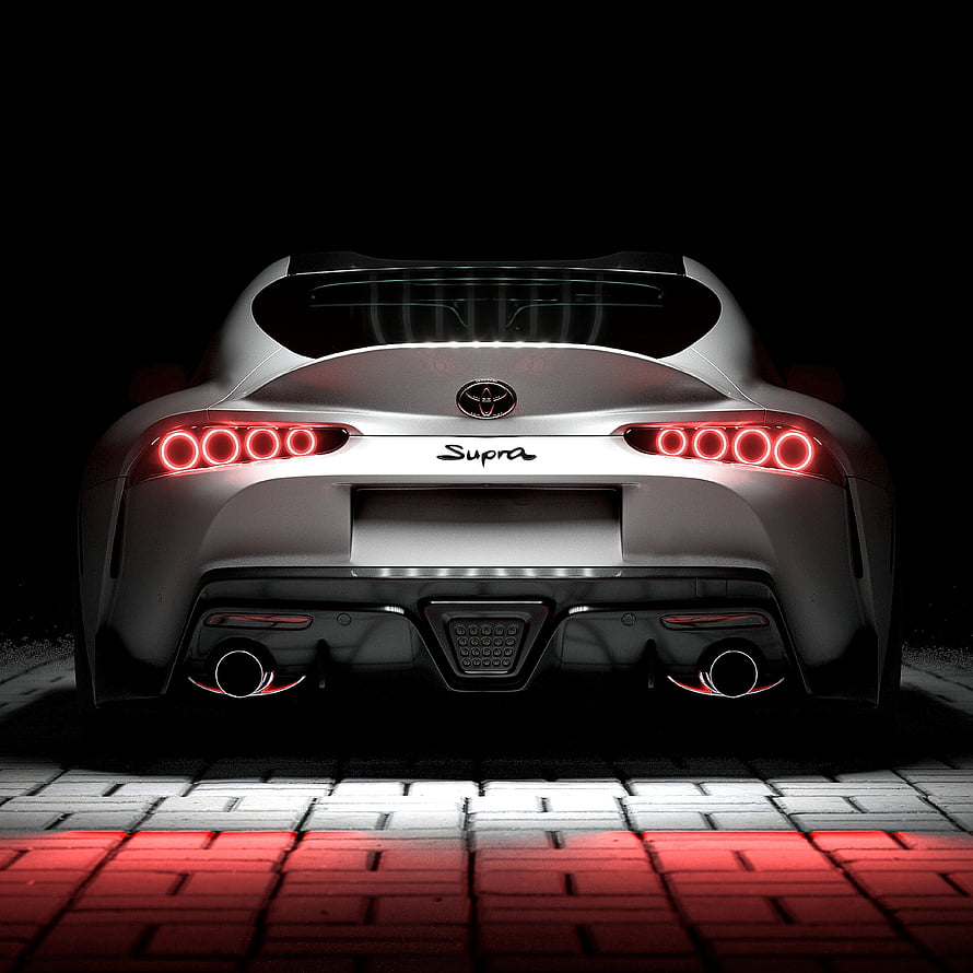 Rear View of Silver Toyota Supra with Glowing Red Tail Lights on Dark Background HD phone wallpaper