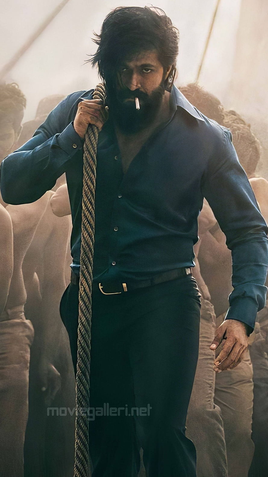 Allu Arjun in Blue Shirt Holding Rope and Smoking Cigarette HD phone wallpaper