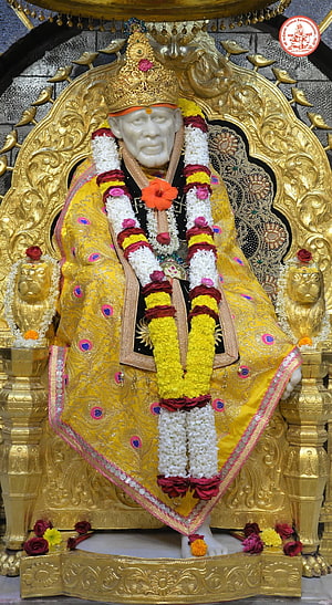 Shirdi Sai Baba Murti Adorned in Golden Garments and Floral Garlands HD phone wallpaper