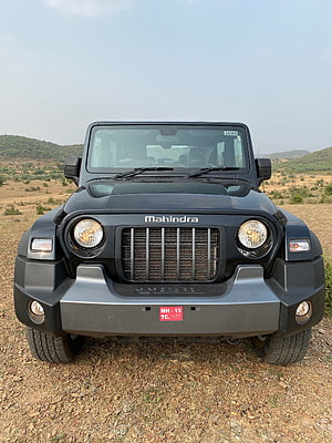 Mahindra Thar Front View in Dry Landscape with Hazy Sky and Rolling Hills HD phone wallpaper