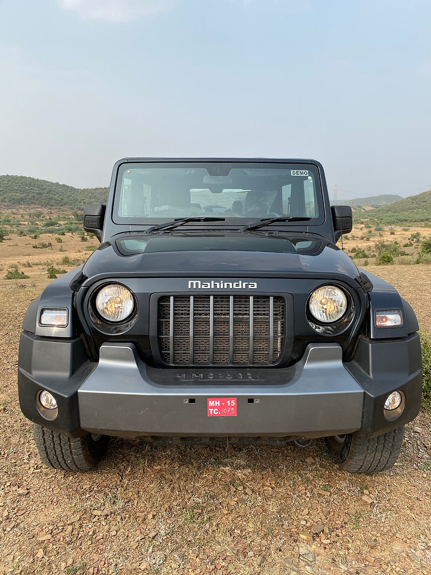 Mahindra Thar Front View in Dry Landscape with Hazy Sky and Rolling Hills HD phone wallpaper