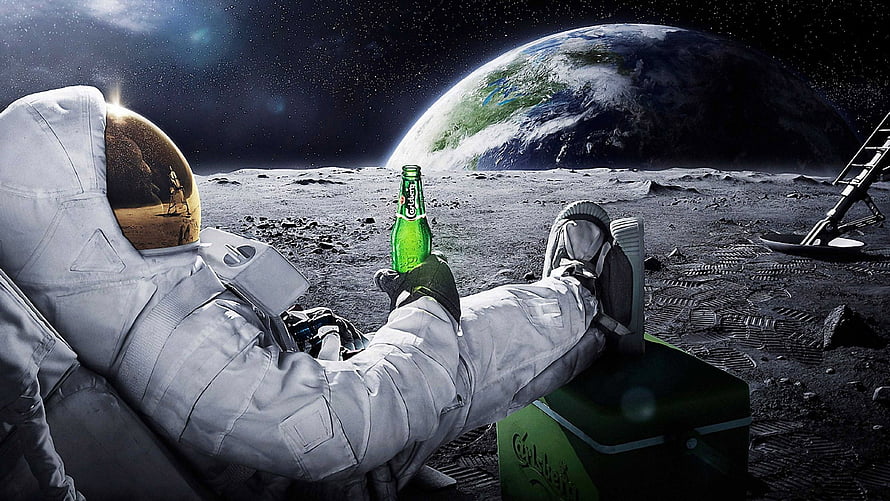 Astronaut Relaxing on the Moon with Carlsberg Beer and Earth in Background HD wallpaper