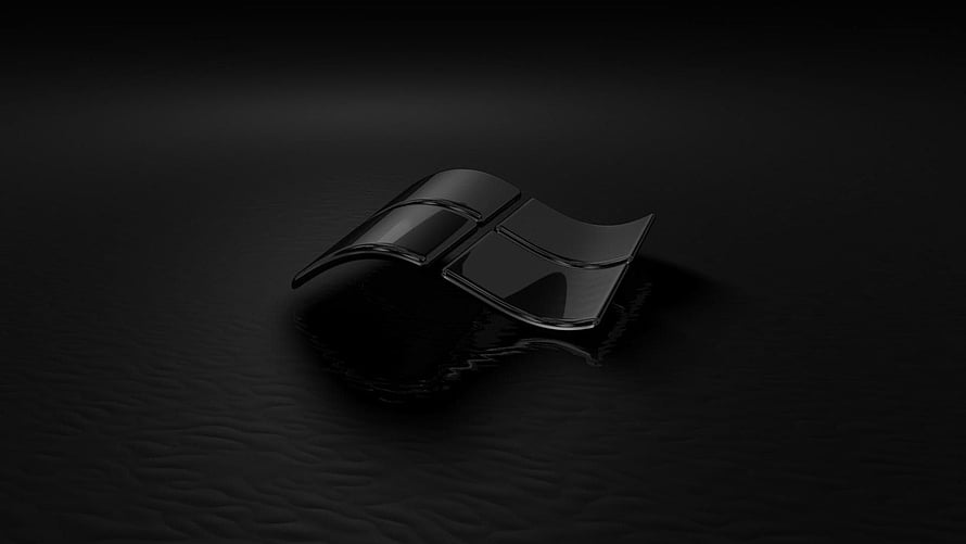 Glossy Black Windows Logo Floating on Dark Water Surface HD wallpaper