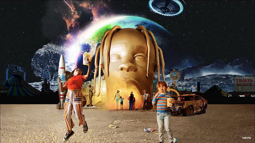 Travis Scott Utopia album cover art featuring giant golden head, children, and cosmic carnival scene HD wallpaper