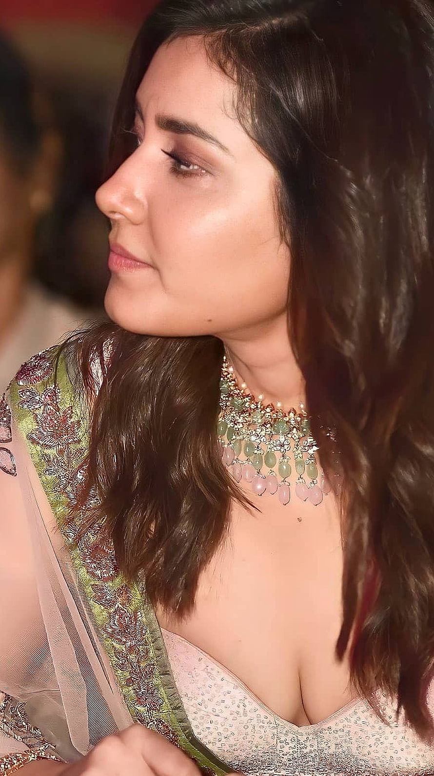 Rashi Khanna in an embroidered green and pink lehenga with a statement necklace HD phone wallpaper