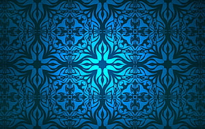 Intricate Blue Tribal Pattern with Symmetrical Floral Motifs and Dark Background HD wallpaper