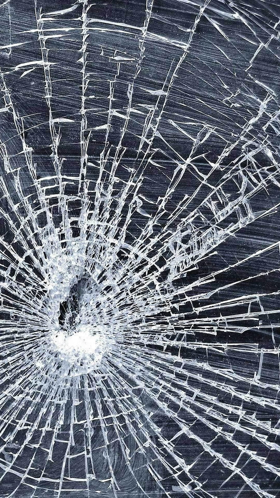 Shattered Glass Texture with Radiating Fracture Lines on Dark Background HD phone wallpaper