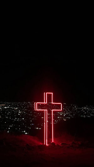 Glowing Red Neon Cross Overlooking City Lights at Night HD phone wallpaper