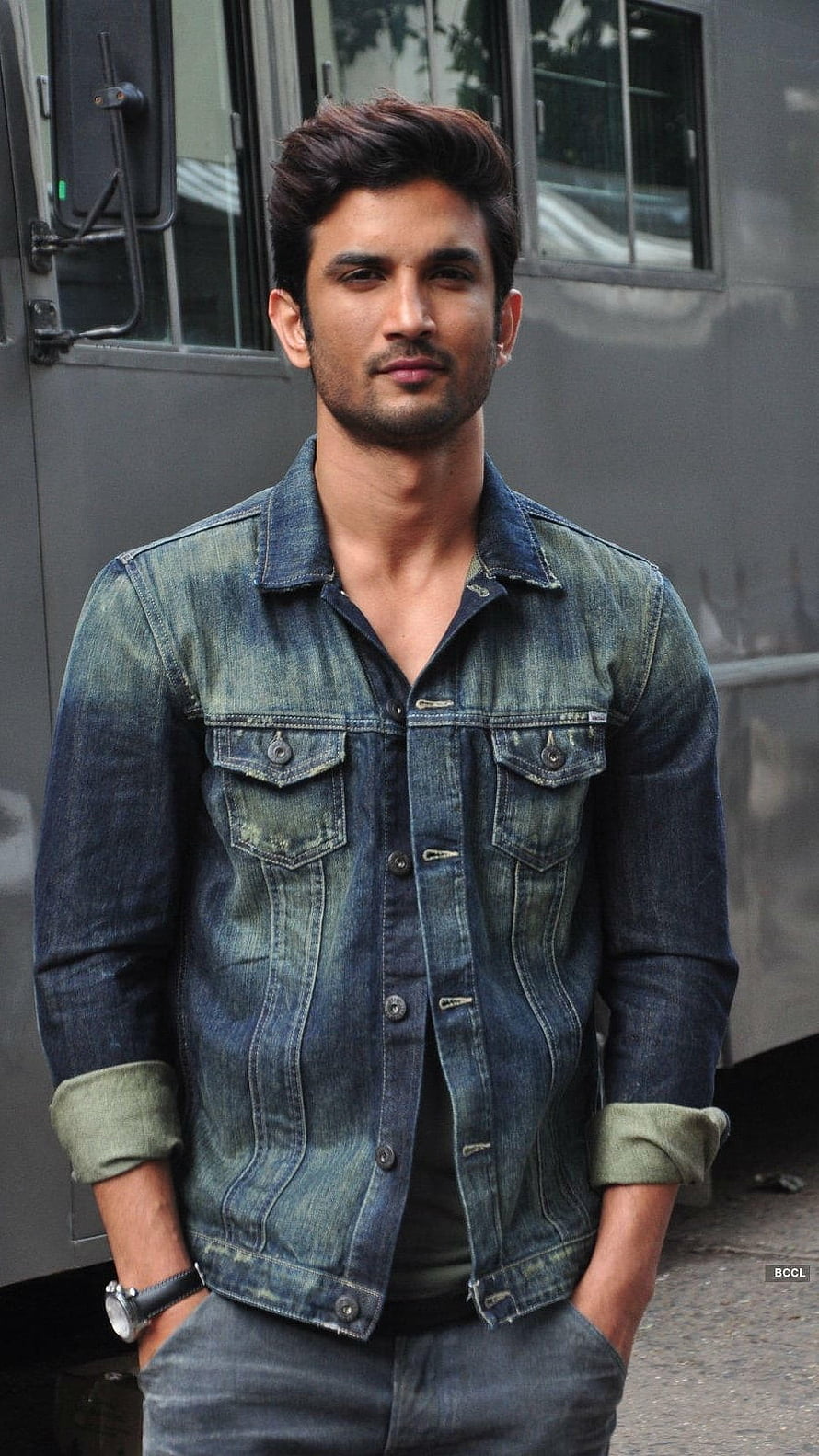 Sushant Singh Rajput in a distressed denim jacket with rolled sleeves and a wristwatch HD phone wallpaper