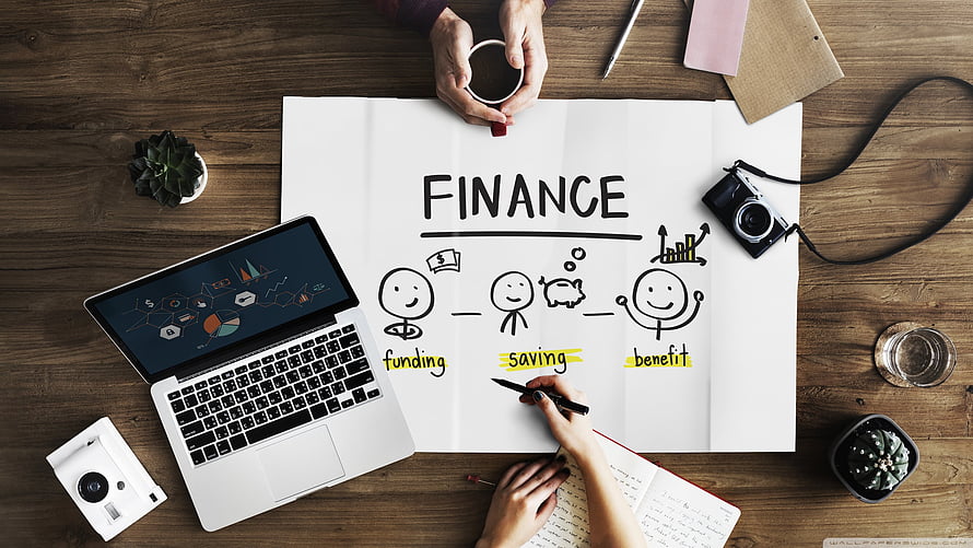 Personal Finance Planning Workspace with Laptop, Sketches, and Coffee on Wooden Desk HD wallpaper