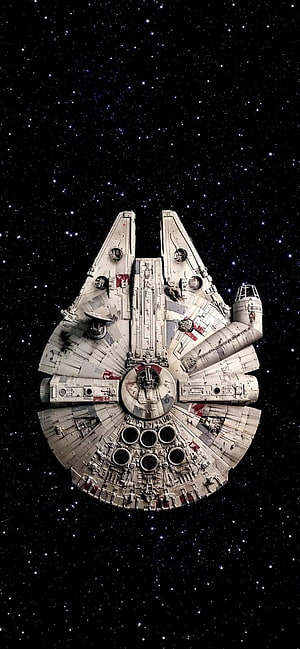 Millennium Falcon Starship in Deep Space with Starry Background HD phone wallpaper