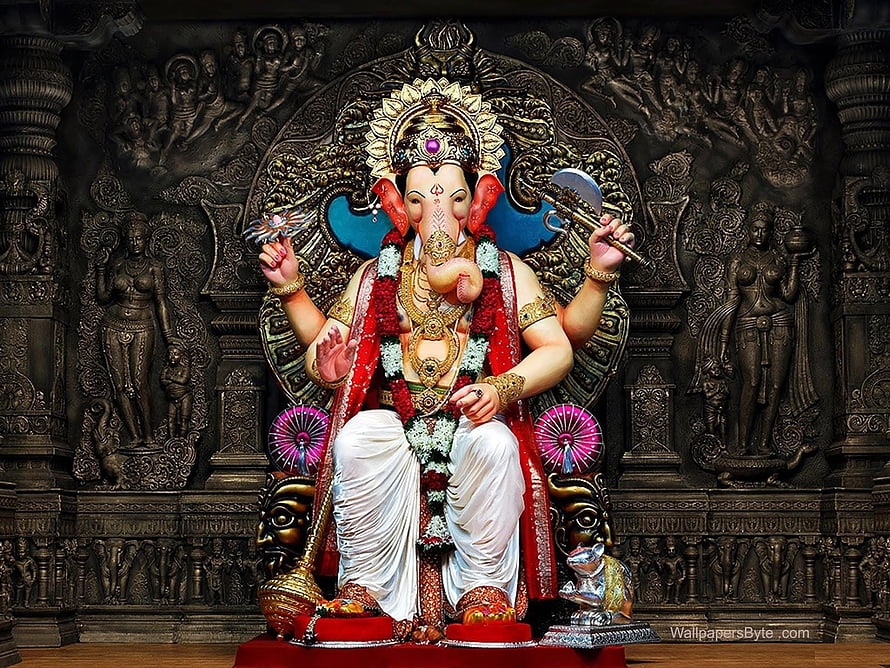 Lord Ganesha Sitting Statue With Axe And Lotus In Ornate Temple Setting HD wallpaper