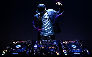 DJ Performing on Pioneer Turntables with Neon Light Trails HD wallpaper
