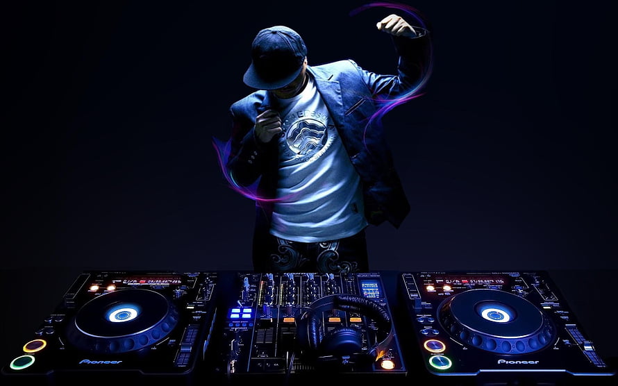 DJ Performing on Pioneer Turntables with Neon Light Trails HD wallpaper