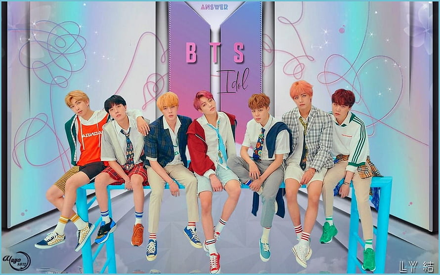 BTS Idol Group Photo Sitting on Blue Bench with Colorful Background HD wallpaper