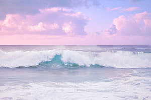 Pastel Pink Sky Over Turquoise Ocean Waves at the Shore HD wallpaper