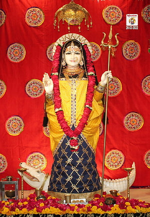 Khodiyar Devi Murti in Yellow Saree with Trident and Crocodile Mount HD phone wallpaper