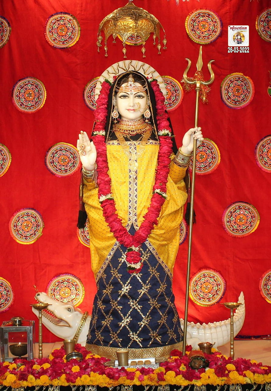 Khodiyar Devi Murti in Yellow Saree with Trident and Crocodile Mount HD phone wallpaper