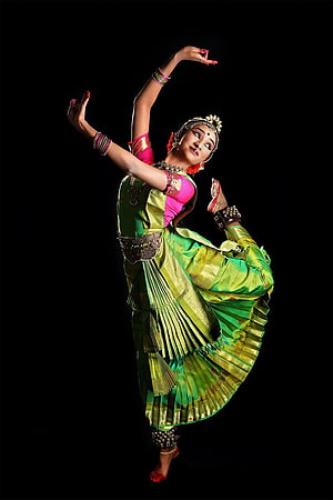 Kuchipudi Classical Dancer in Green Silk Saree Performing Graceful Pose HD phone wallpaper