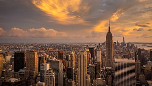 Empire State Building and New York City Skyline at Golden Sunset HD wallpaper