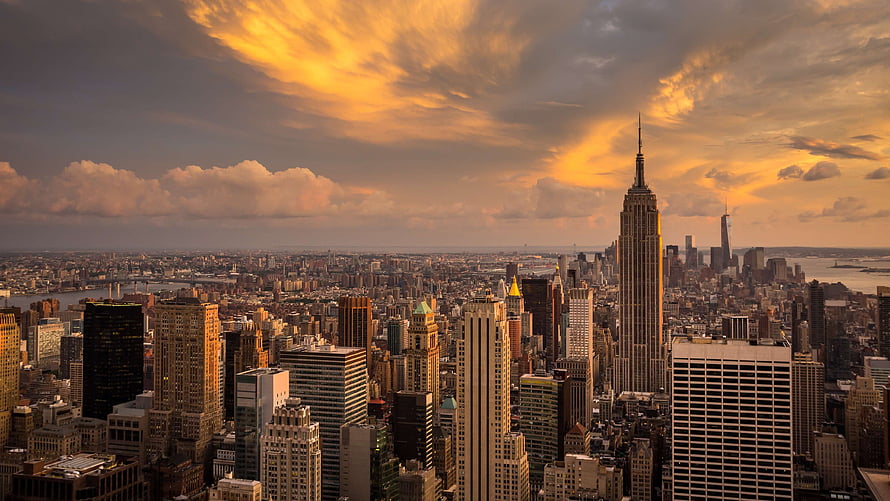 Empire State Building and New York City Skyline at Golden Sunset HD wallpaper