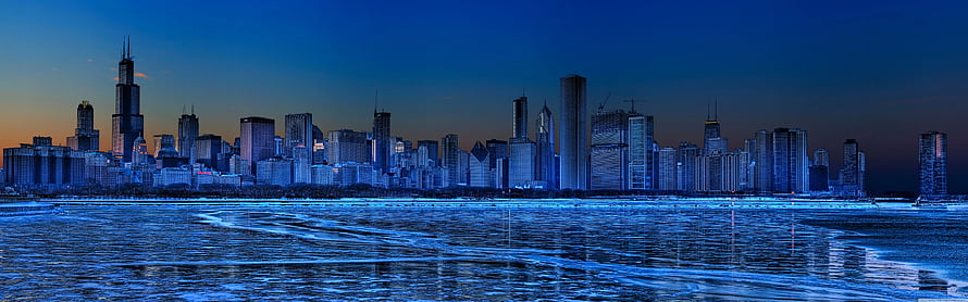 Chicago Skyline at Dusk Over Frozen Lake Michigan HD wallpaper