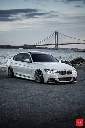 White BMW 340i F30 Sedan Parked Near Water With Suspension Bridge in Background HD phone wallpaper