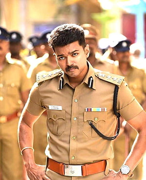 Indian Police Officer in Khaki Uniform with Rank Insignia and Service Ribbons HD phone wallpaper