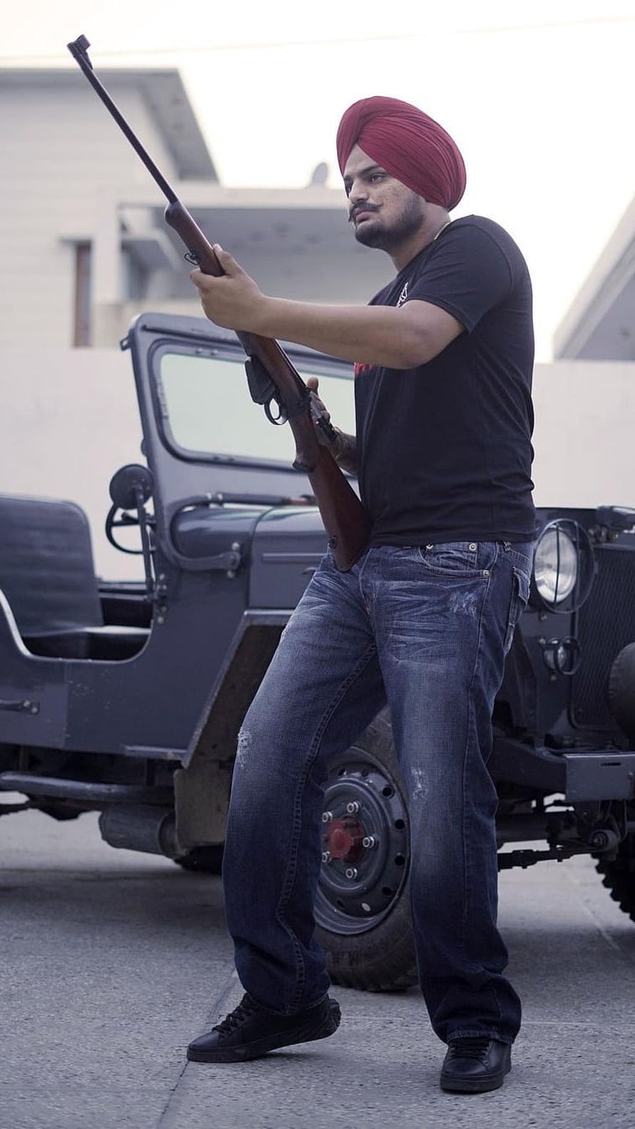 Man in Red Turban Holding Rifle Standing in Front of Vintage Military Jeep, Sidhu Moose Wala Black, Jeep, Gun Background, gun, background HD phone wallpaper