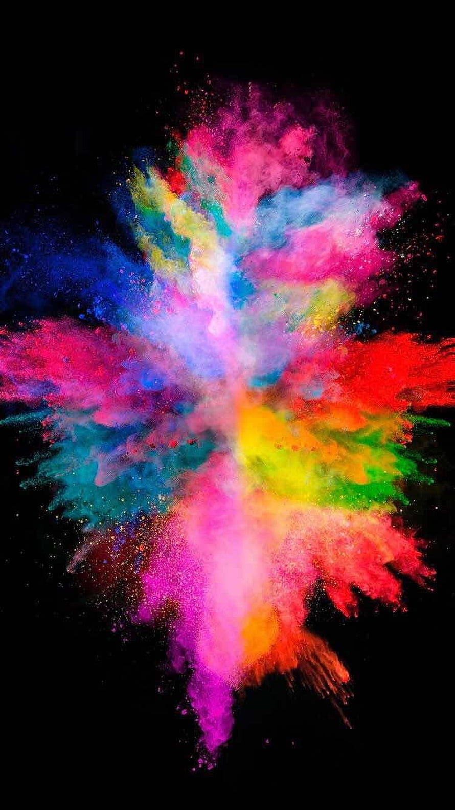 Vibrant Multicolored Powder Burst Against a Deep Black Background HD phone wallpaper