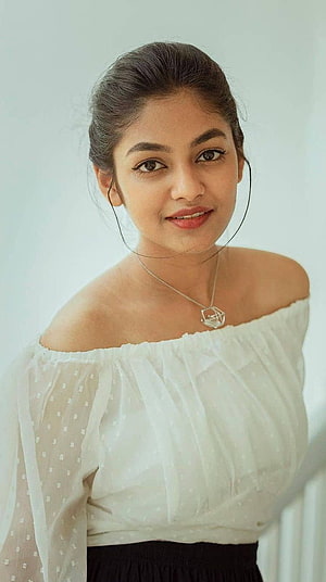 Portrait of a woman wearing a white off-shoulder top with a geometric necklace, Ivana, tamil actress, cute HD phone wallpaper