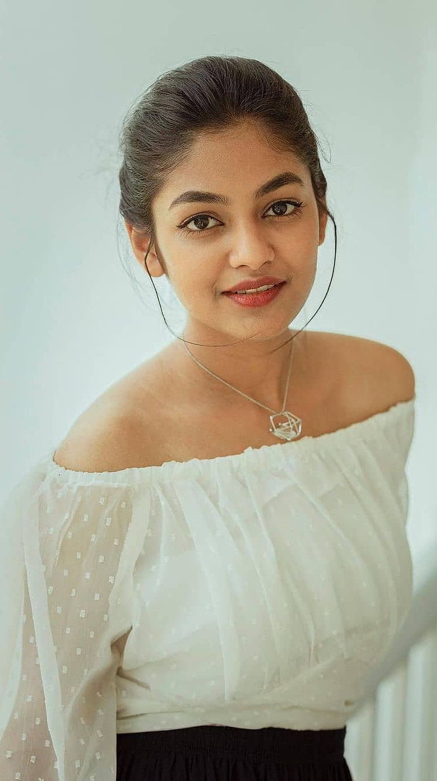 Portrait of a woman wearing a white off-shoulder top with a geometric necklace, Ivana, tamil actress, cute HD phone wallpaper