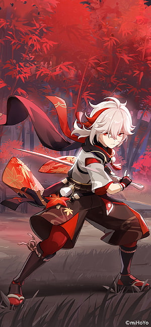 Kazuha from Genshin Impact in a dynamic combat stance within a vibrant red maple forest HD phone wallpaper