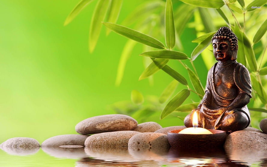 Zen Buddha Statue with Candle and Bamboo Leaves on Smooth Stones HD wallpaper